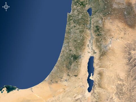 Mapa satelital de Israel y sus regiones circundantes, que muestra el valle del Jordán con el lago de Galilea al norte y el Mar Muerto al sur. – Número de diapositiva 1