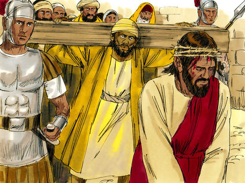 Jesús estaba débil por los golpes que había recibido y se cayó. Los soldados tomaron a un hombre de la multitud, Simón de Cirene (ciudad al norte de África) y lo obligaron a llevar la cruz. – Número de diapositiva 2