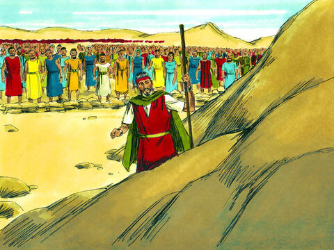 Los líderes siguieron a Moisés hasta la roca en Horeb y lo estaban mirando cuando él golpeó la roca con su báculo. – Número de diapositiva 30
